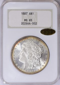 1887-MORGAN-NGC-MS-65-w-GOLD-CAC-1